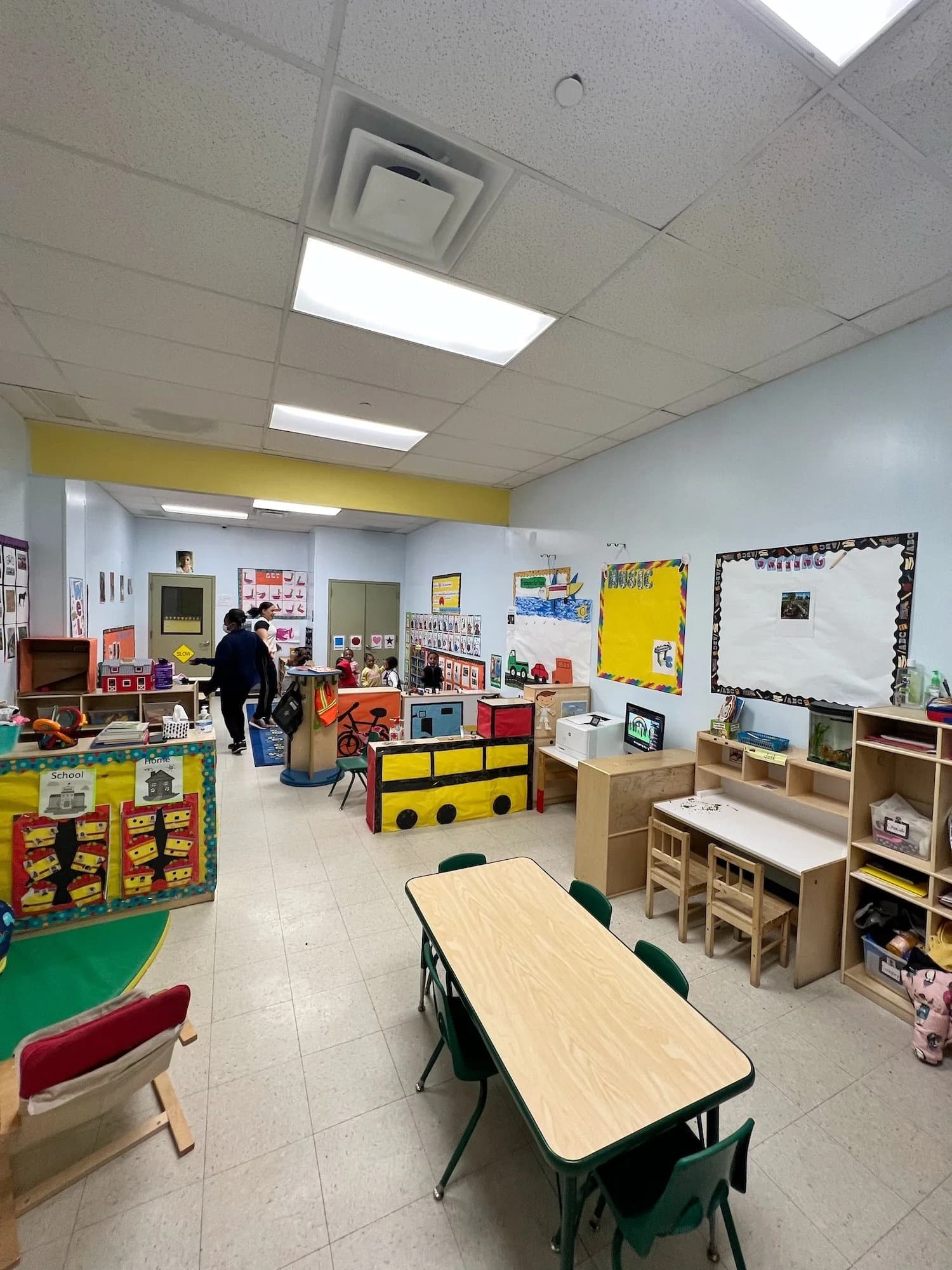 A well-organized preschool classroom with learning centers and activity stations