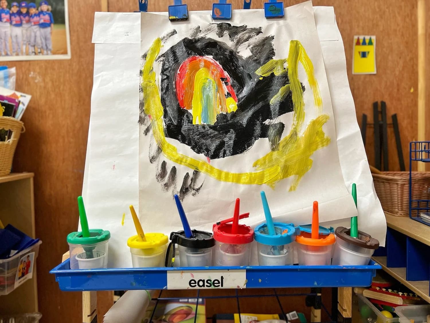 Child painting at Einstein Daycare center-based program in East Flatbush Brooklyn