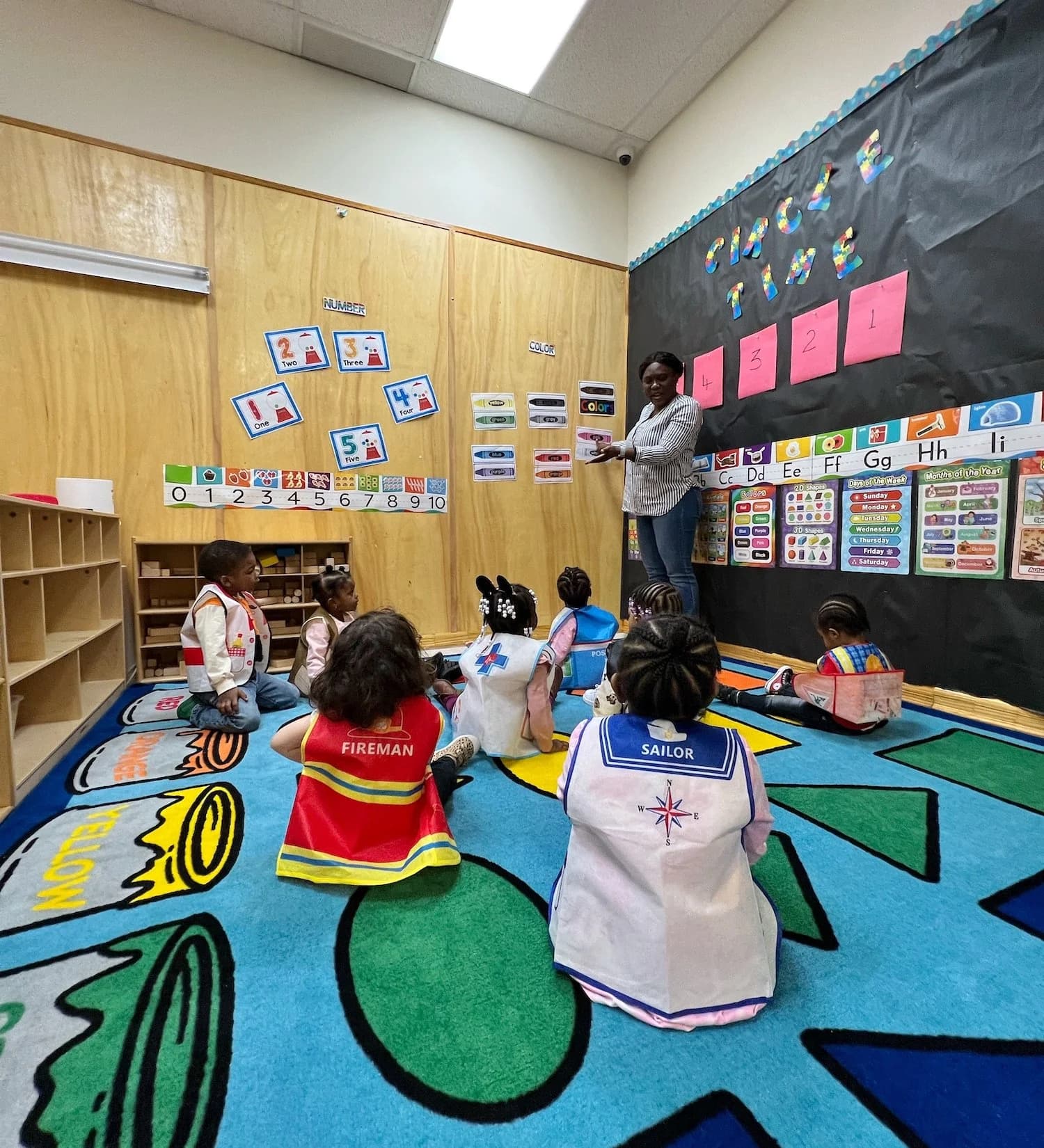 Toddlers participating in circle time routine at Einstein Daycare serving Crown Heights and East Flatbush Brooklyn families